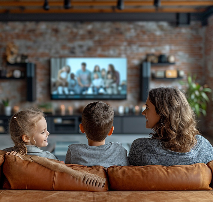 A family watching TV in their living room