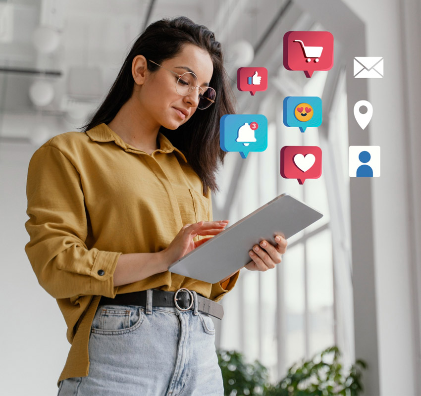 Woman on ipad with social media icons over the tablet